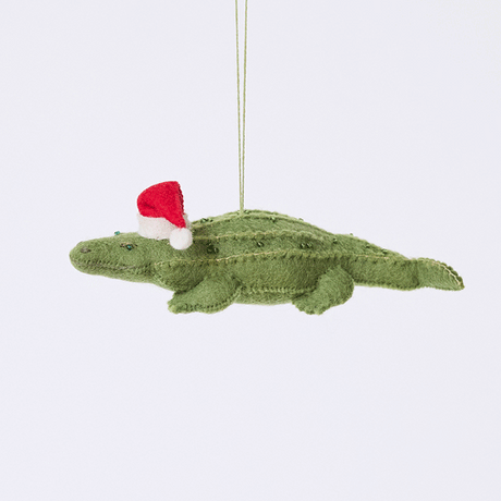 Craftspring’s Santa Alligator Ornament rotating to show front, side, and back views — felt alligator with a beautiful face and embroidered and beaded back ridges, a playful ornament perfect for holiday gifting — heirloom-quality Christmas decor, ethically crafted by artisans using sustainable wool.