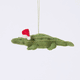 Craftspring’s Santa Alligator Ornament rotating to show front, side, and back views — felt alligator with a beautiful face and embroidered and beaded back ridges, a playful ornament perfect for holiday gifting — heirloom-quality Christmas decor, ethically crafted by artisans using sustainable wool.