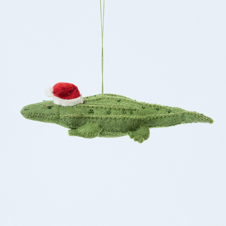 Craftspring’s Santa Alligator Ornament rotating to show front, side, and back views — felt alligator with a beautiful face and embroidered and beaded back ridges, a playful ornament perfect for holiday gifting — heirloom-quality Christmas decor, ethically crafted by artisans using sustainable wool.