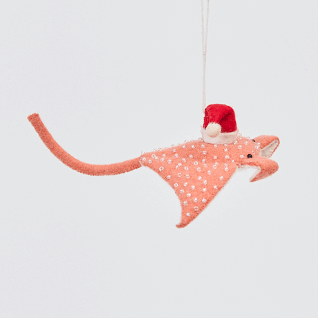 Spinning view of Craftspring’s Santa Coral Manta ornament, highlighting the shimmering beaded accents, festive Santa hat, and elegant embroidered wings—artisan-made with sustainable wool for joyful holiday decorating.