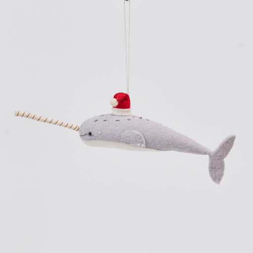 Handmade felt Santa Gray-Blue Narwhal ornament from Craftspring rotating to show front, side, and back views—featuring intricate beaded and embroidered details and a red Santa hat, ethically crafted by artisans using sustainable wool.