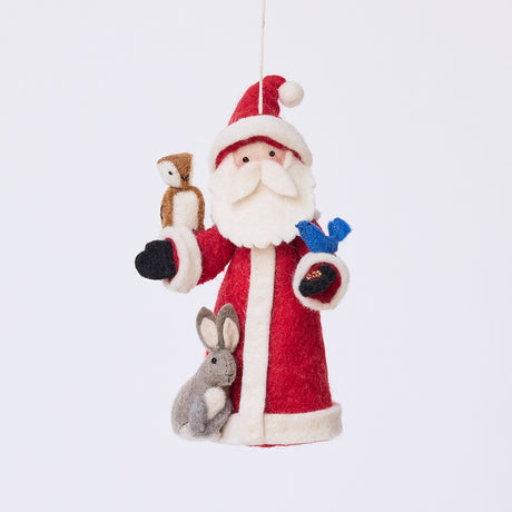 Handmade felt Santa with Woodland Animals ornament from Craftspring, featuring a Santa holding beaded birdseed with a bunny next to him, and an owl and a bluebird perched on his arms—heirloom-quality Christmas decor, ethically crafted by artisans using sustainable wool.