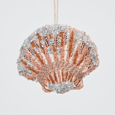 Craftspring’s Scallop Shell Ornament rotating to show front, side, and back views — made of satin with intricate beaded and embroidered details, ethically crafted by artisans.