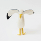 Let your holiday décor take flight with our handcrafted Seagull Tree Topper, a whimsical coastal alternative to the traditional star or angel. With wings fully outstretched, bright yellow legs, and classic black-tipped feathers, this charming seabird captures the freedom and beauty of life by the ocean.