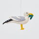 Handmade felt Seagull ornament from Craftspring, featuring detailed embroidery and a fish in its beak—heirloom-quality Christmas decor perfect for nautical lovers, sustainably handmade by artisans using wool.