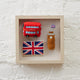 London-themed felt shadow box featuring three handmade wool ornaments on a cream fabric background. Includes British icons like a red phone booth, Queen’s Guard, and Big Ben. Wall décor for nurseries, kids’ rooms, or travel lovers. Fair trade, ready to hang, no glass cover.