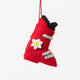 Handcrafted in vibrant red wool felt, this charming little boot features soft gray buckles, a delicate white edelweiss flower with sunny yellow beaded details, and a touch of alpine nostalgia.