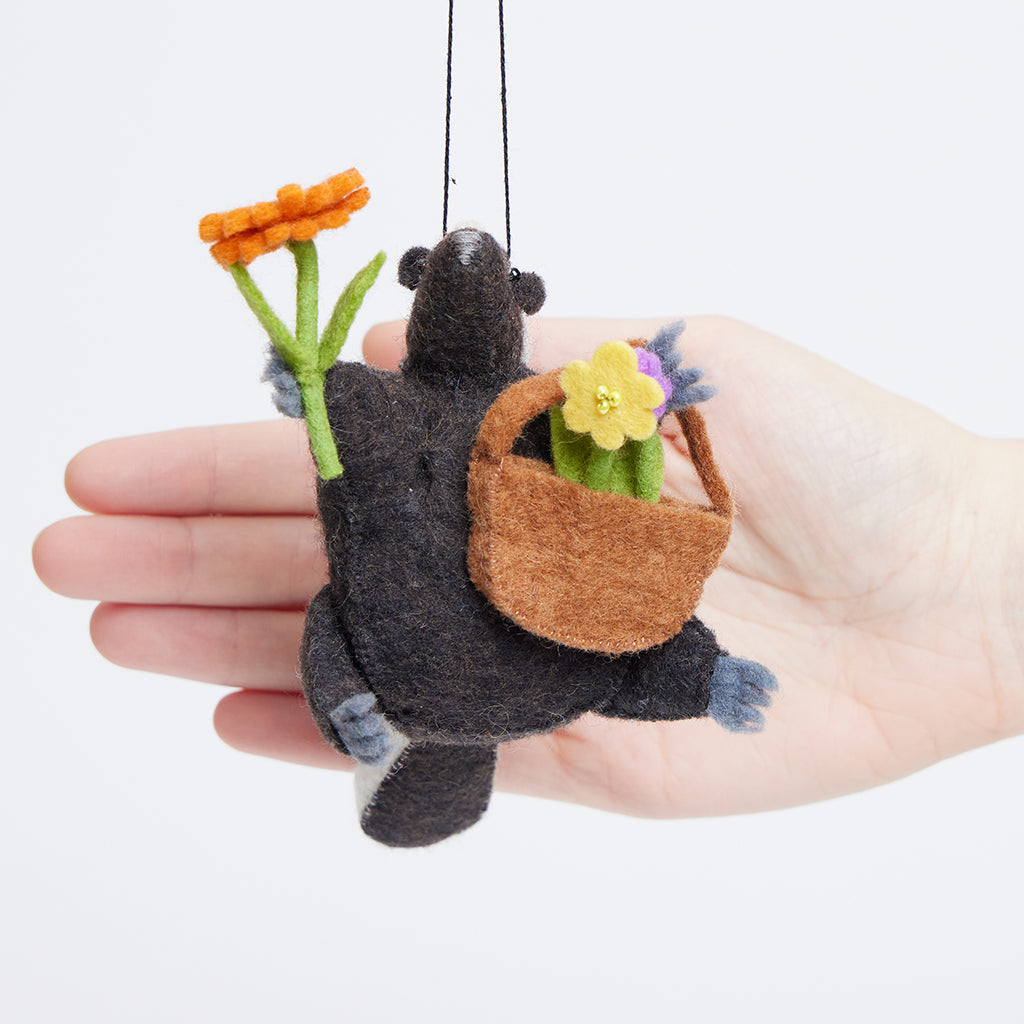 Skunk with Flowers Ornament