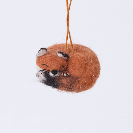 Craftspring’s Sleepy Fox Ornament rotating to show front, side, and back views — curled up with a cute face, fluffy tail, and whiskers, a keepsake felt ornament for holiday gifting — heirloom-quality Christmas decor, ethically crafted by artisans using sustainable wool.