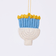 Handmade felt Small Silver Menorah ornament from Craftspring rotating to show front, side, and back views — white base with silver embroidery and blue candles with flames, ethically crafted by artisans using sustainable wool for Hanukkah and holiday traditions.