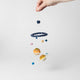 Solar system felt mobile ornament featuring hand-felted planets and sun. Perfect gift for science teachers, kids, and astronomy fans. Handmade wool décor.

