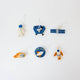 Blast off into a universe of discovery with our Space Mini Ornaments Set. This delightful collection includes five handcrafted felt ornaments inspired by the wonders of space: an astronaut, satellite, space shuttle, rocket ship, and meteor, along with a coordinating Explorer badge that can be displayed as a keepsake or worn as a symbol of curiosity and adventure.