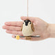 Celebrate the quiet beauty of everyday birds with our Sparrow Ornament. Small yet full of personality, this beloved garden bird is lovingly hand-felted from natural wool and perched on a delicate felt branch.