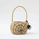 A hand-crocheted raffia Spider Basket featuring a bold black spiderweb and playful spider detail, perfectly sized for trick-or-treating, Halloween treasures, and festive fall displays.