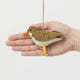 Bring a touch of the shoreline to your holiday décor with our delightful Spotted Sandpiper Ornament. Carefully handcrafted from eco-friendly wool felt, this charming bird captures the distinctive features of the beloved sandpiper, from its warm brown plumage and bright orange beak to its delicate spotted breast.