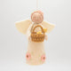 Handmade Spring Angel ornament holding baby chicks – a symbol of renewal and hope for Easter or springtime décor.