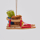 Handmade felt Squirrel with Presents on Sled ornament from Craftspring rotating to show front, side, and back views—featuring a squirrel on a vintage sled filled with presents, showcasing heirloom-quality craftsmanship, ethically crafted by artisans using sustainable wool.