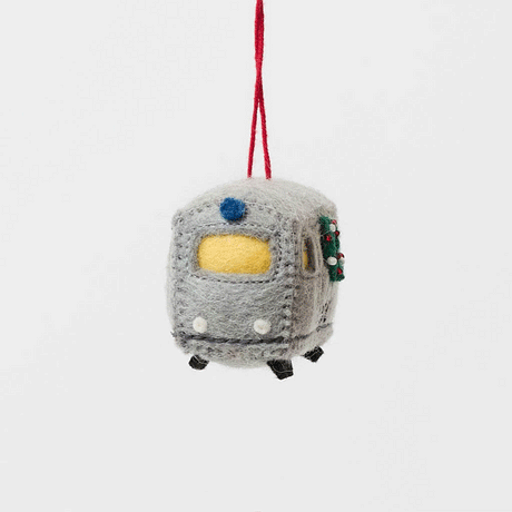Celebrate the rhythm of New York City with our handmade NYC Subway Train Car Ornament, a charming felt keepsake inspired by the iconic subway cars that keep the city moving.
