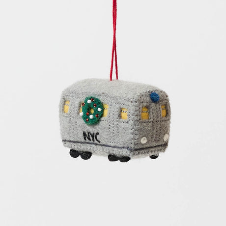 Celebrate the rhythm of New York City with our handmade NYC Subway Train Car Ornament, a charming felt keepsake inspired by the iconic subway cars that keep the city moving.