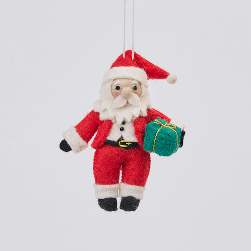 Handmade felt Sweet Little Santa ornament from Craftspring rotating to show front, side, and back views—featuring rosy cheeks, a cute round nose, and a gift, showcasing heirloom craftsmanship, ethically crafted by artisans using sustainable wool.