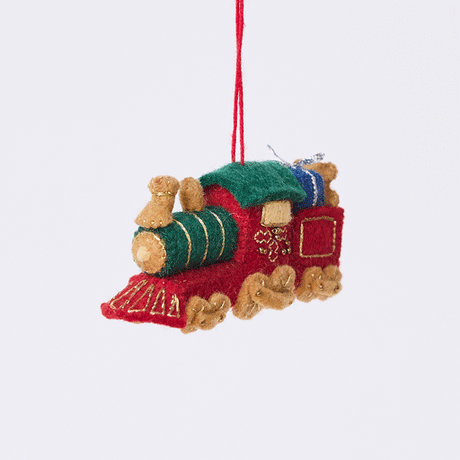Craftspring’s Toy Train Ornament rotating to show front, side, and back views — felt red and green train with gold embroidery, carrying presents and a teddy bear, a playful ornament perfect for holiday gifting — heirloom-quality Christmas decor, ethically crafted by artisans using sustainable wool.