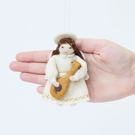 Craftspring’s Vintage-Style Angel Playing Lute Ornament displayed in front of a hand to show its size—handmade felt angel with beaded and golden embroidered details, heirloom-quality Christmas ornament, perfect for holiday gifting, ethically crafted by artisans using sustainable wool.