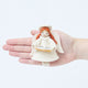 Craftspring’s Vintage-Style Angel Singing Noel Ornament displayed in front of a hand to show its size—handmade felt angel with intricate beaded and embroidered details, heirloom-quality Christmas ornament, perfect for holiday gifting, ethically crafted by artisans using sustainable wool.