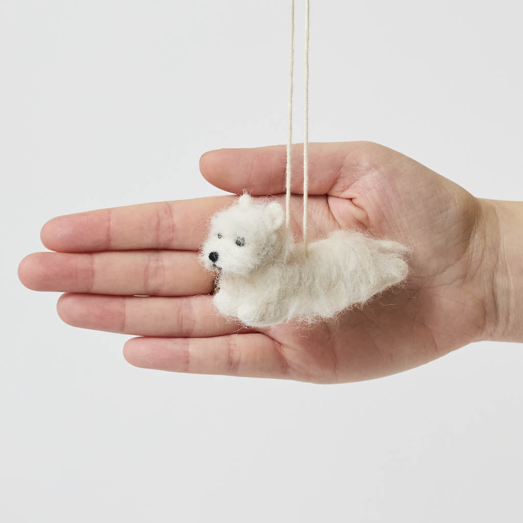 Full of personality and unmistakable charm, our alpaca&nbsp;Westie Ornament brings this beloved breed to life in soft, handcrafted detail. Carefully made by skilled artisans, this adorable pup features the Westie’s signature fluffy white coat, alert expression, and compact, sturdy stance.