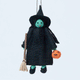 Handmade felt Wicked Witch Trick-or-Treater Ornament from Craftspring rotating to show front, side, and back views—green-skinned witch with hat, broom, and pumpkin basket, heirloom-quality Halloween decor, ethically crafted by artisans using sustainable wool.