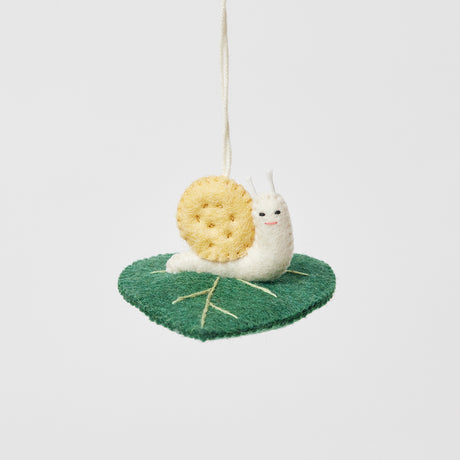 Hand-felted garden snail ornament with spiral shell – whimsical wool decor for plant lovers