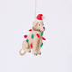 Craftspring’s Yellow Lab in Christmas Lights Ornament rotating to show front, side, and back views — felt dog wrapped in Christmas lights and wearing a Santa hat, a whimsical ornament perfect for holiday gifting — heirloom-quality Christmas decor, ethically crafted by artisans using sustainable wool.
