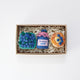 Blueberry-themed felt ornament gift set in a kraft box with crinkle paper. Includes a felt blueberry jam jar, blueberry pint basket, and blueberry pancake stack. Handmade from wool felt using traditional needle-felting. Fair trade and ready to hang.