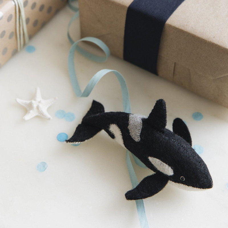 A Craftspring handmade felt orca ornament
