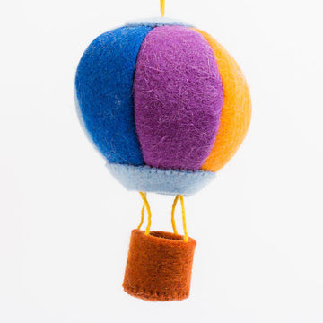 A Craftspring handmade felt rainbow hot air balloon ornament