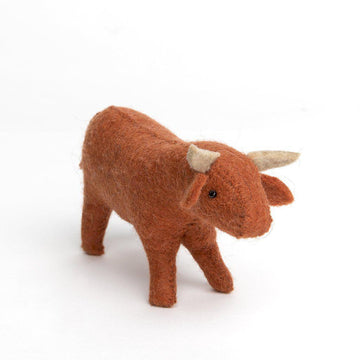 A Craftspring handmade felt brown bull ornament