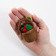 Handcrafted strawberry ornament made from sustainable wool, artisan-made in Kyrgyzstan