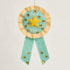Teacher appreciation felt badge featuring a gold embroidered star ribbon, handcrafted from wool felt. Perfect gift for students, teachers, and graduations.

