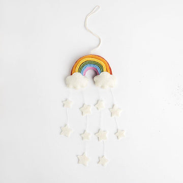 A Craftspring handmade felt twinkle star rainbow ornament with strings of hanging white stars