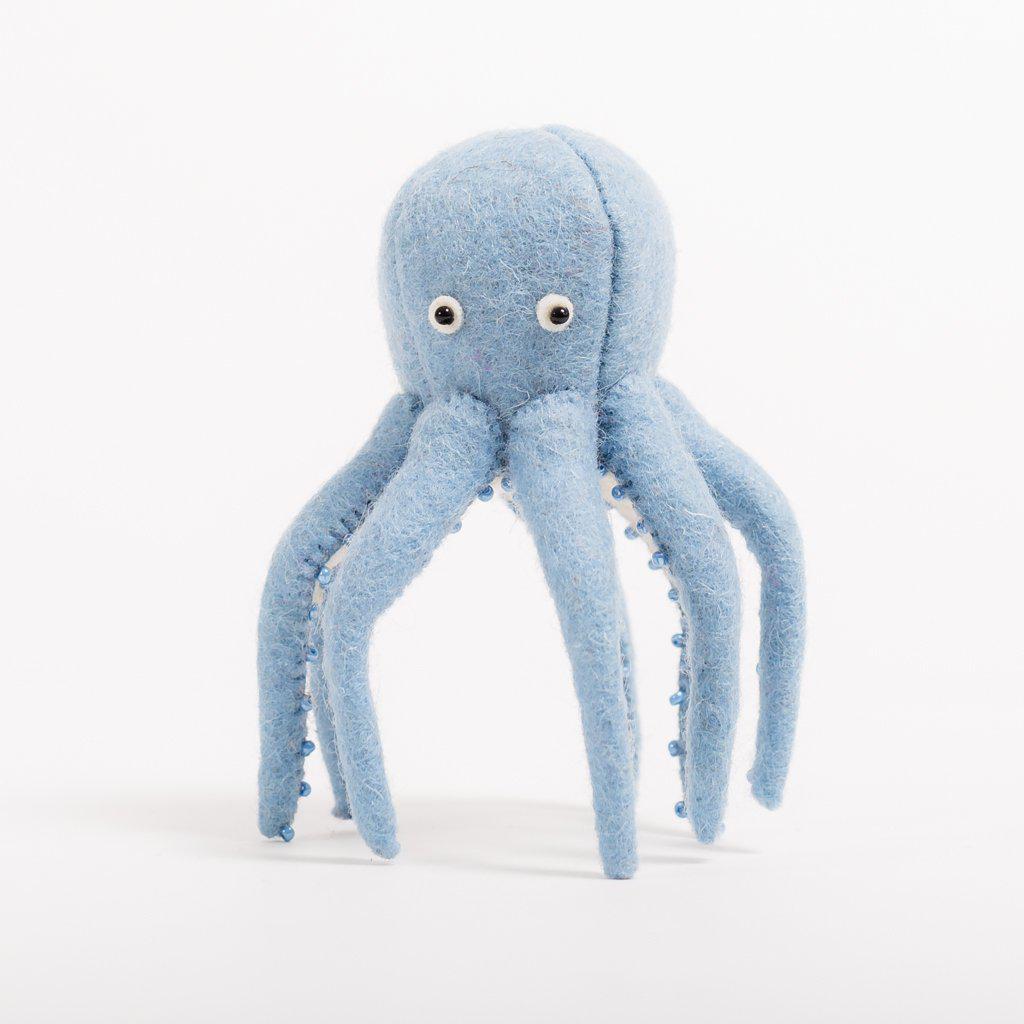 A Craftspring handmade felt octopus ornament in light blue with beaded suction cups and eyes 