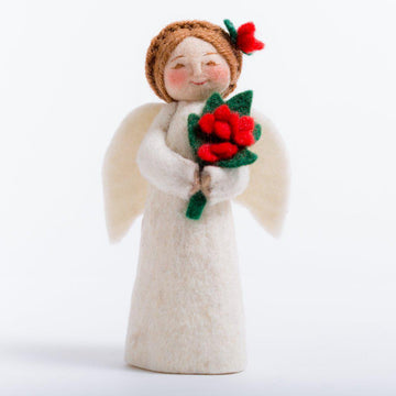 A Craftspring handmade felt angel ornament wearing white robes holding a bouquet of poinsettias with her hair up in braids