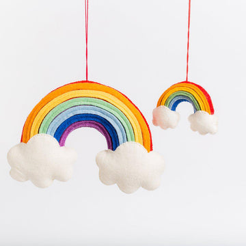 A Craftspring handmade felt rainbow ornament with two little clouds